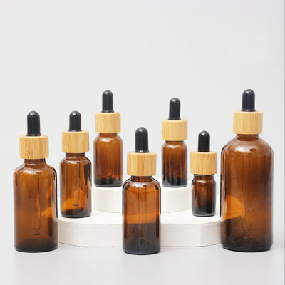 Good price Glossy Amber Color Bamboo Essential Oil Glass Dropper Bottle Wood Cap Glass Cosmetic Containers online